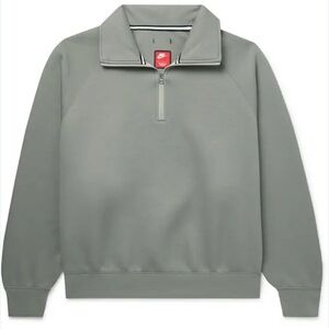 Woman’s Nike Gray Sweatshirt. Worn a few times, runs large